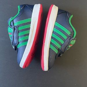 K-Swiss Dinosaur shoes. Toddler size 6.
